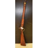 A 19th century percussion carbine, 53cm sighted barrel with two bands, ram rod, full stock,