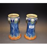 A pair of Royal Doulton Art Nouveau tube lined vases, c.