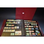 ** Stamp /stamps : large album of Empire/CW mint and used QV to QEII.