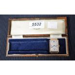 A Gentleman's vintage Trebex 9ct gold cased wristwatch head, rectangular silvered dial,