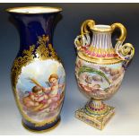 An Italian twin handled urn profusely decorated with Putti;
