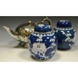 A pair of Chinese ginger jars and covers, printed with flowering prunus; an EPNS teapot,
