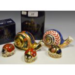 A Royal Crown Derby, paperweight, Garden Snail, limited Edition, boxed, gold stopper; Blue Ladybird,