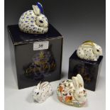 A Royal Crown Derby paperweight, 25th Anniversary Rabbit, boxed, gold stopper; Baby Rabbit, boxed,