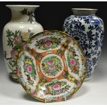 Oriental Ceramics - a Japanese blue and white baluster shaped vase,