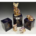 A Royal Crown Derby paperweight, Seated Tabby Cat, gold stopper, boxed; Contented Kitten, boxed,