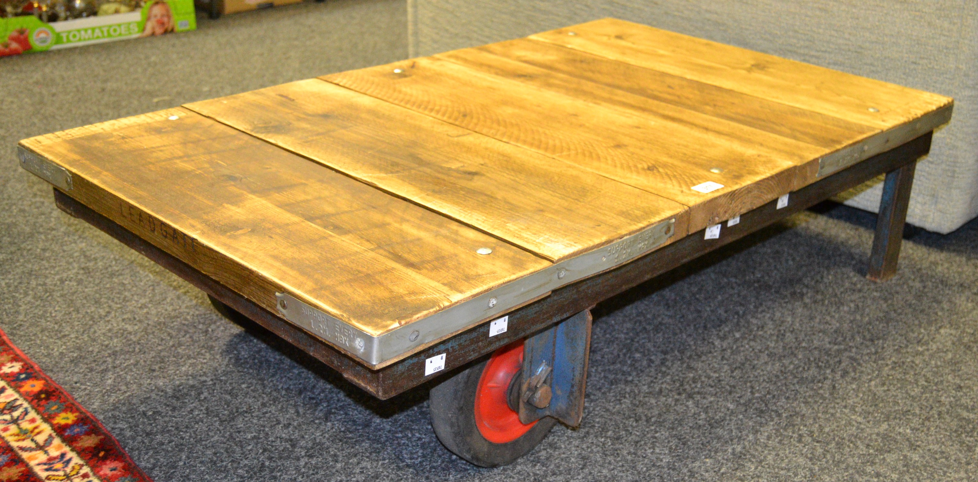 Industrial Salvage - a salvaged scaffolding planked coffee table on an earlier industrial base,