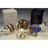 A Royal Crown Derby paperweight, original series Badger, gold stopper, boxed; Debenham's Squirrel,