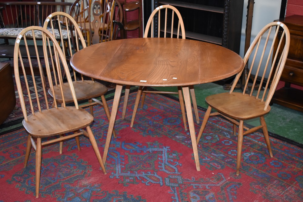 An Ercol dropleaf table;