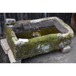 A 19th century Derbyshire gritstone trough, 28cm high, 90cm long,