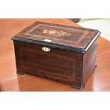 A 19th century rosewood, marquetry and scumbled rounded rectangular music box, 15.