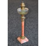 A 19th century Corinthian pink marble and scagliola columnar oil lamp,