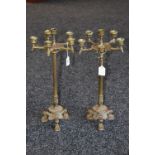 A pair of 19th century Grecian Revival 'Grand Tour' six light tall table candleabra,