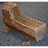 A 19th century scumbled pine child's cradle,