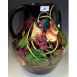 A large contemporary Moorcroft Queens Choice pattern two-handled vase,