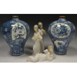 Ceramics - a pair of Royal Bonn Flaminian pattern blue and white floral tapering inverted baluster