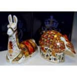 A Royal Crown Derby paperweight Collectors Guild Llama, boxed, gold stopper; an Armadillo, boxed,