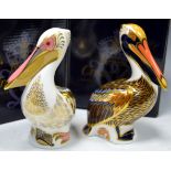 A Royal Crown Derby paperweight, White Pelican, Event piece, boxed, gold stopper; Brown Pelican,