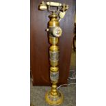 A 1960/1970s, floor standing, ornate brass, cradle telephone,