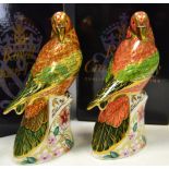 A Royal Crown Derby paperweight, Sun Parakeet, boxed, gold stopper; Lorikeet, limited edition ,