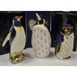 A Royal Crown Derby paperweight, Rockhopper Penguin, boxed, gold stopper; Emporer Penguin,