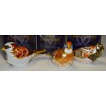 A Royal Crown Derby paperweight, Linnet, boxed, gold stopper; House Sparrow, boxed,