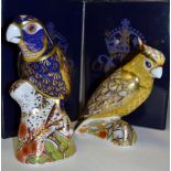 A Royal Crown Derby paperweight, Bronze winged Parrot, boxed, gold stopper; Citron Cockatoo, boxed,