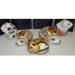 A Royal Crown Derby paperweight, Hawthorne Hedgehog, boxed, gold stopper; Sleeping Dormouse, boxed,