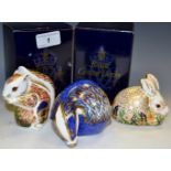 A Royal Crown Derby paperweight, Buxton Badger, commissioned by Sinclairs, boxed,