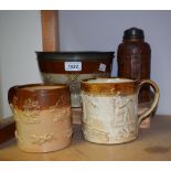 A 19th century salt glazed stoneware mug, applied in relief with hounds at chase,