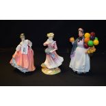 A Royal Doulton ceramic figure, Country Love HN2418; others, Fair Lady HN2835,