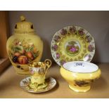 A Limoges trio; an Aynsley Orchard Gold jar and cover;