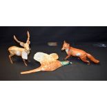 A Beswick ceramic model of a stag; another, fox; a pheasant wall plaque,