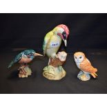 A Beswick model of a Woodpecker, impressed marks, 1218, 22cm high; a Beswick model of a Kingfisher,