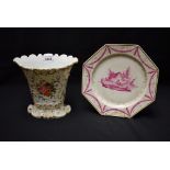 A Vienna octagonal plate, painted in puce with thatched cottage, the rim with swags, gilt line rim,
