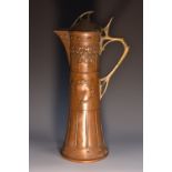 A WMF Art Nouveau copper and brass ewer, of tapering cylindrical form,