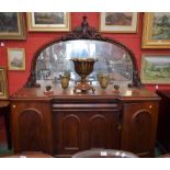 A Victorian mahogany inverted break front mirror back sideboard, foliate pediment, arched mirror,