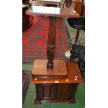 A small mahogany cabinet and a mahogany torchere stand