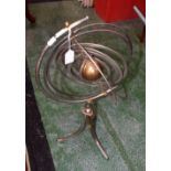 A metalwork orrery style desk toy.
