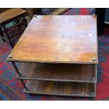 A walnut and brass three tier coffee table/centre whatnot.