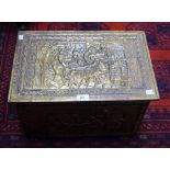 A brass slipper/log box