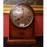 A large mahogany inlaid dome topped bracket clock,