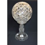A cut glass table lamp, spherical shade,