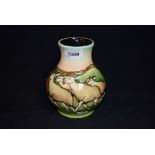 A contemporary Moorcroft vase tube lined with sheep, 28/40,