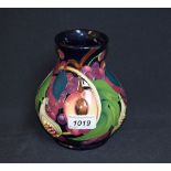 A contemporary Moorcroft vase tube lined with Pomegranate, c.