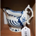 A Derby dolphin ewer cream jug, in relief with shell moulding, picked out in blue, scroll handle,