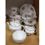 A Royal Crown Derby Posies tea set for six comprising teapot, cream jug, sugar bowl, cake plate,
