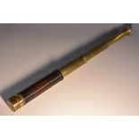 A 19th century lacquered brass four-drawer telescope, mahogany cylinder grip,