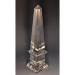 A Grand Tour cut glass prismatic library obelisk, skirted pedestal base,