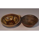 A Native American terracotta bowl,